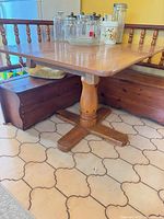 Table full view showing top, pedestal and base
