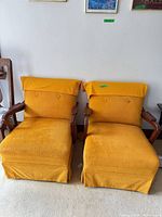 Both armchairs front view showing overall design and pair
