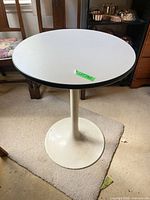 Full view of round pedestal table