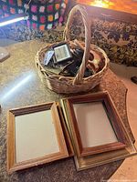 overview of basket, loose larger frames on table