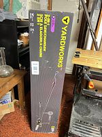 Front of Yardworks boxed 2-in-1 pole saw / chainsaw