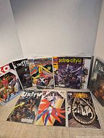 Front and back rows showing all ten bagged comics