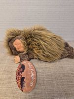 Full view of Anne Geddes baby hedgehog plush doll with hang tag