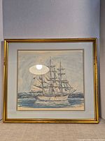 Front view of framed artwork showing entire piece