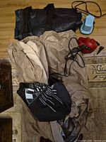 Air mattress spread out with pumps and bag in view