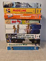 Stack of nine VHS spines showing most titles