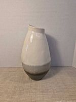 Front view of ceramic vase showing color gradient and glazing