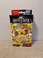 Front of sealed Ampharos ex Battle Deck packaging