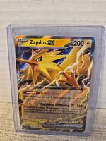 Front view of Zapdos ex card in top loader