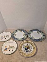 All five plates grouped for size and design overview