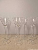 All six etched martini glasses front view