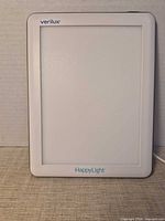 Front view of Verilux HappyLight lamp powered off