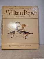 Front dust jacket with title and illustration of ducks