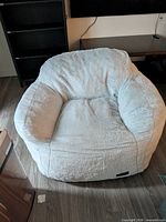 Front view of oversized faux fur chair