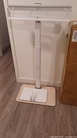 Full view of assembled stand showing column and mount