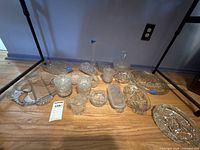 Group shot of all glassware pieces arranged on floor