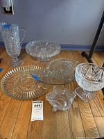 Group shot of all six pressed glass items