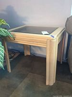 Full view of side table next to sofa