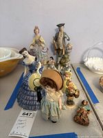 Group shot of all figurines displaying variety and scale