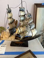 Full starboard view of ship music box on base showing sails and rigging