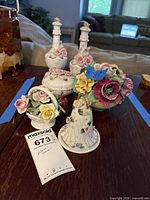 Group view showing all five Kew Royal bone china floral figurines