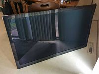 Front view of Panasonic Viera TV standing on floor
