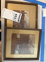 Overall view showing two small frames; lower frame is the pastel drawing in brown wood frame