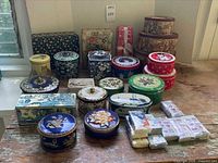 Group shot of assorted tins and tissue packs