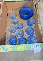 Box view showing majority of bowls stacked with plates