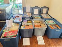 Eight totes filled with assorted vintage jigsaw puzzle boxes with inventory sheets on lids