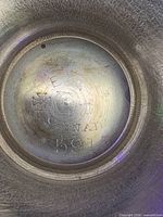 underside hallmark of silver-plated piece reading EP star CANADA 507