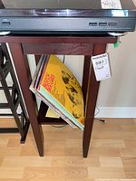 Full view of accent table holding turntable and records