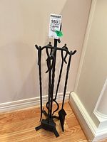Full view of fireplace tool set on stand