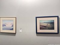 Both framed artworks on wall showing images and frames