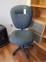 Front view of grey fabric office chair showing full structure