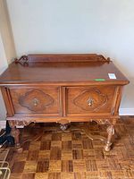 Full view of sideboard showing front doors, legs, overall condition