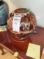 Full view of ceramic mushroom lamp on table