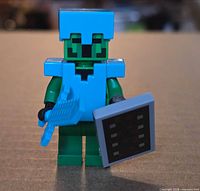 Front view of Cactus Knight minifigure holding sword and shield