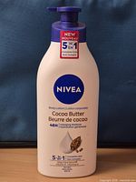 Front of the 625 mL Nivea Cocoa Butter body lotion bottle showing label and pump