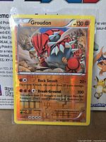 Card front in sleeve showing reverse holo finish and details