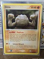 Front of Ditto 62/113 card in sleeve
