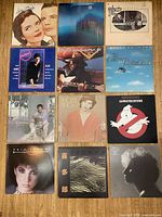 Group shot of all twelve LP record jackets arranged in a grid