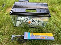 Aquarium tank, black hood, cords, Petcetera heater box, sponge