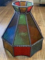 Side view showing multicolour glass panes and metal frame