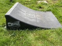 Top and side view of black Discount Ramps curved plastic ramp