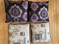 Front view of all four pillows showing patterns and quantity