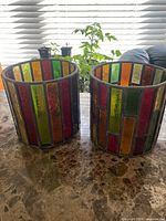Front view of both mosaic stained glass candle holders