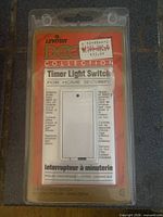 Front of sealed Leviton 6681 timer light switch package