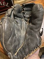 Inside palm showing leather, finger stalls and lacing