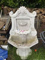 Full view of resin fountain showing back panel and basin